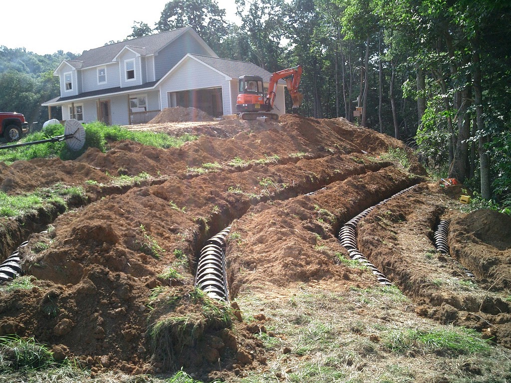 Crew working on a septic tank